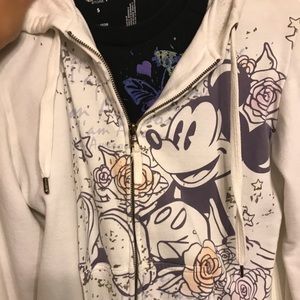 Disney White hoodie and black Disney shirt.